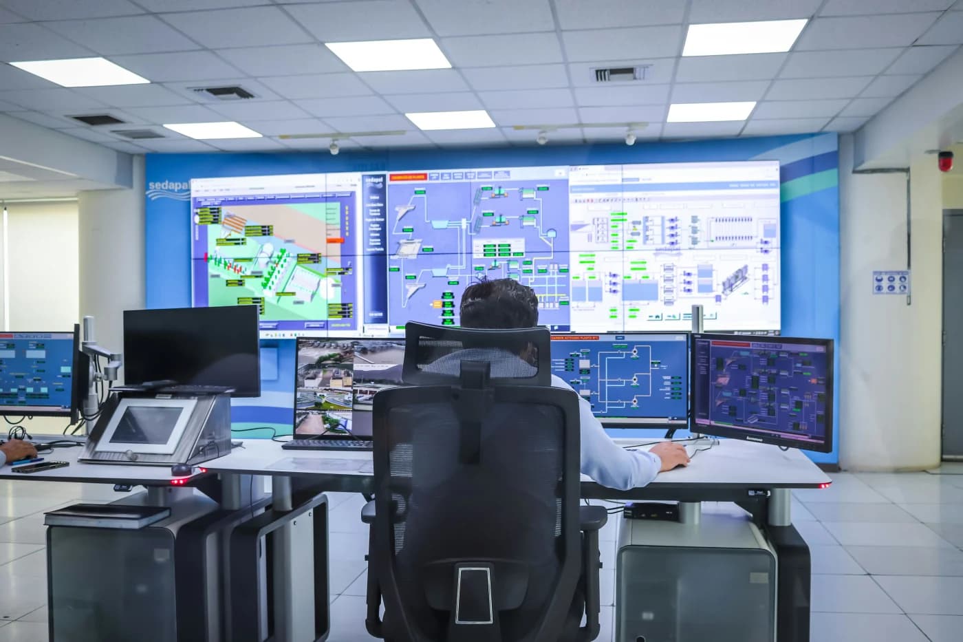 Engineer working with an industrial robotics system